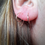 Load image into Gallery viewer, Gold Scroll Huggy Hoops