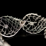 Load image into Gallery viewer, Torchon Lace Continuous Bracelet
