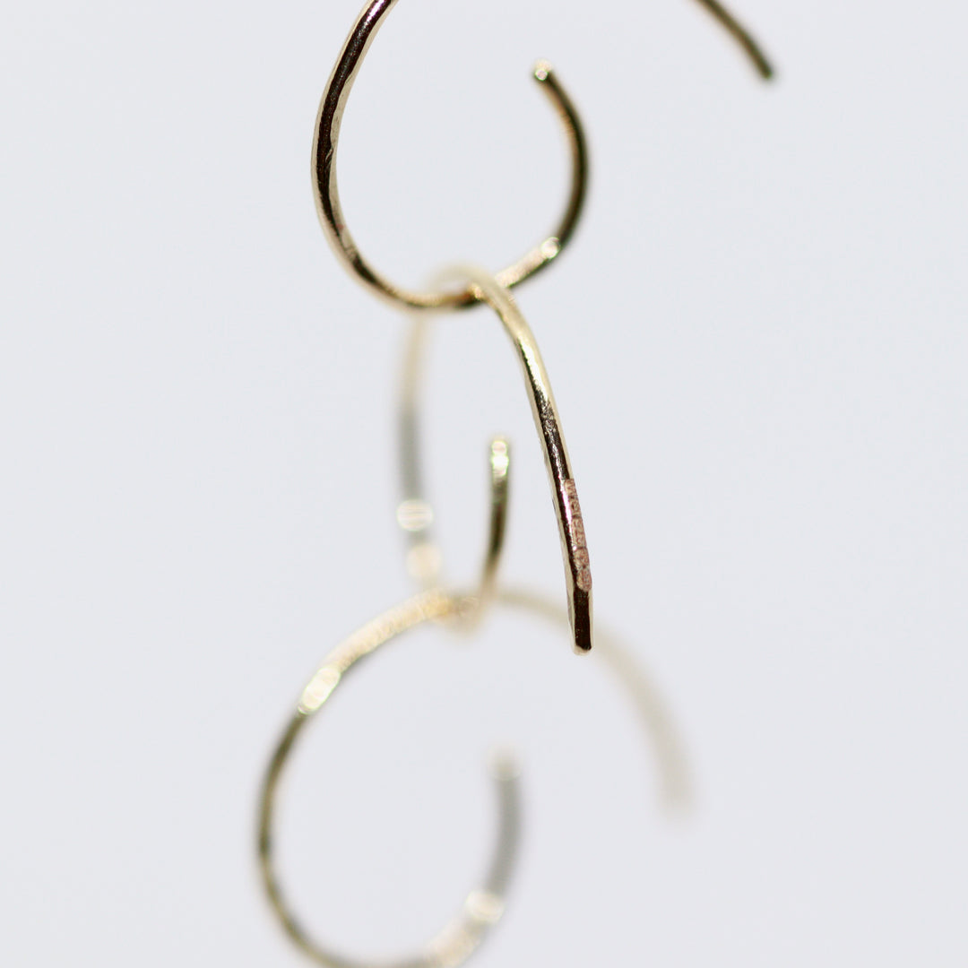 Gold Scroll Huggy Hoops