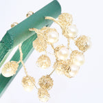 Load image into Gallery viewer, Crocheted Gold Pearl Hoop Earrings
